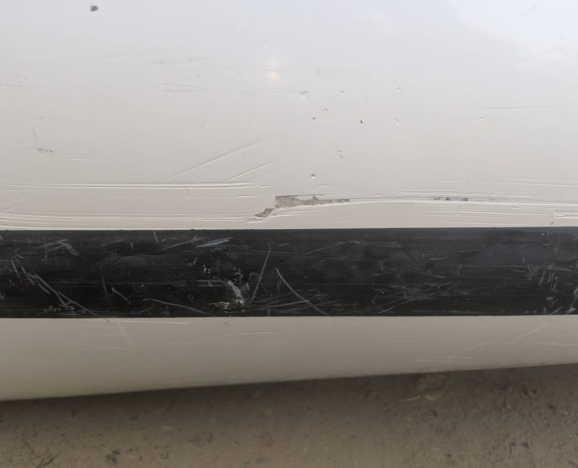 Cracked gel coat on the hull of the Shadow